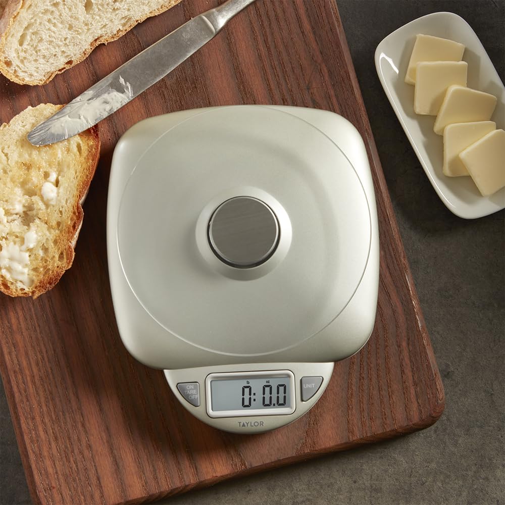 Taylor tempered glass platform supports easy cleaning and stable weighing.