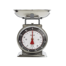 Tare function on Taylor scale enabling zeroing with containers for net weight.