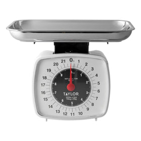 Taylor Analog Kitchen Scale dial offers precise 22 lb readings for recipes.