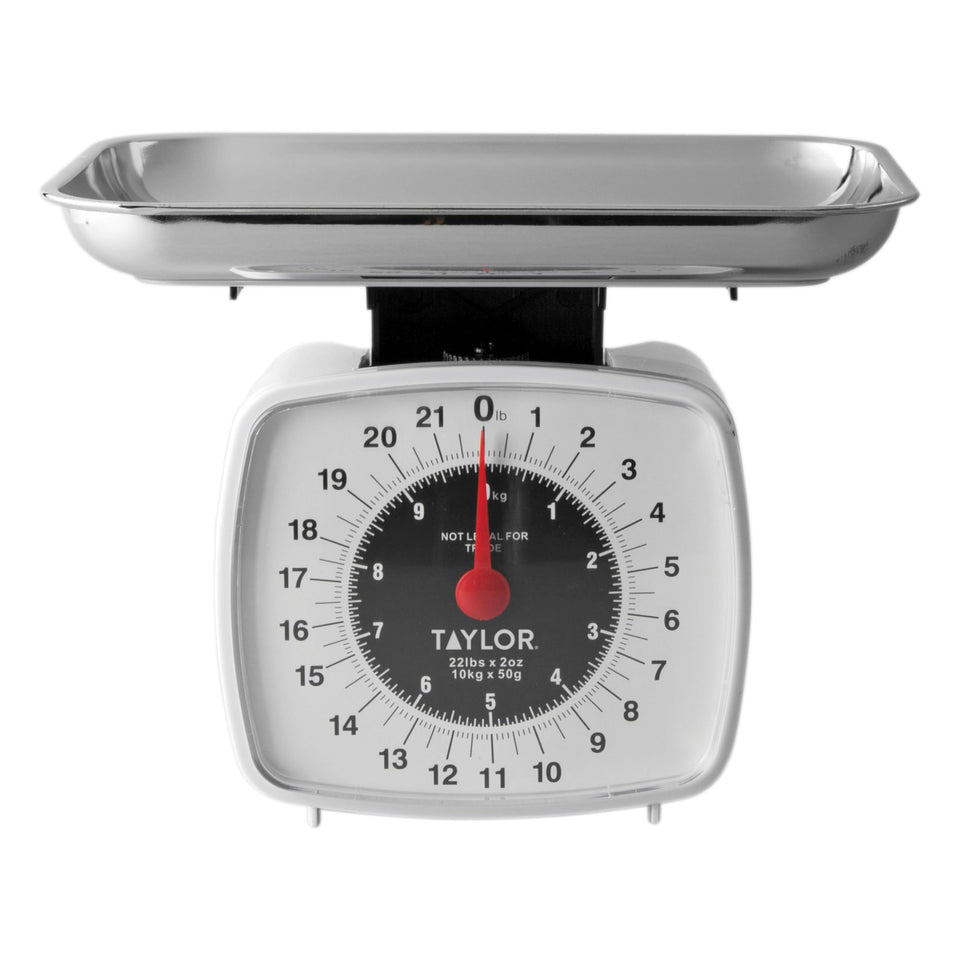 Taylor Analog Kitchen Scale dial offers precise 22 lb readings for recipes.