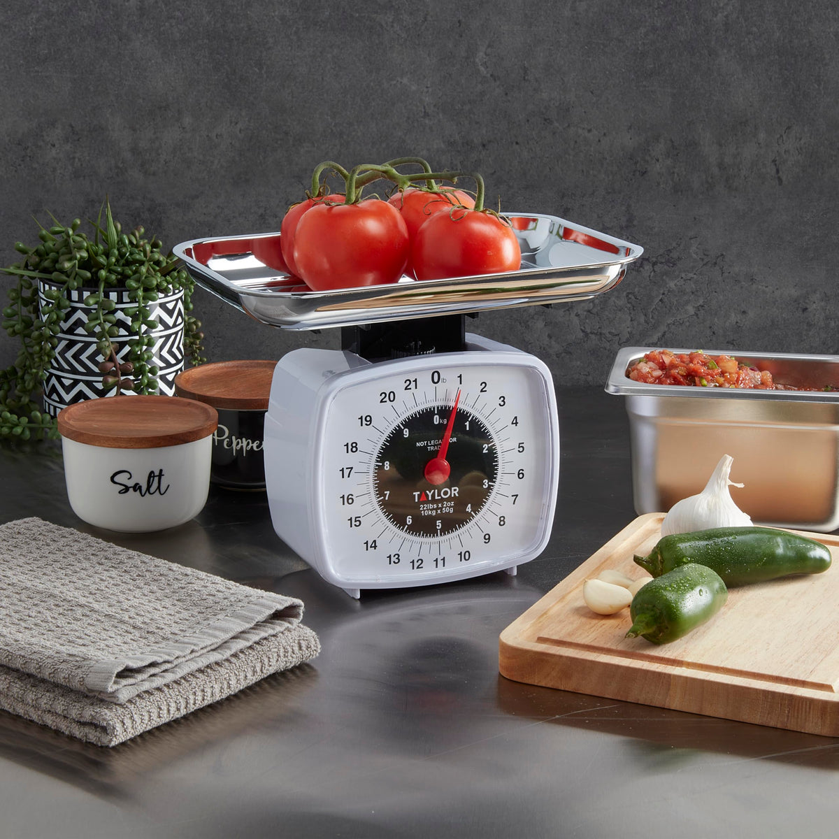 Taylor Analog Kitchen Scale dial is protected by a scratch-resistant lens for clarity.
