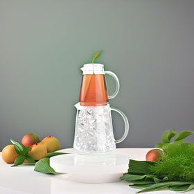 Tea Forte Hand-blown heat-resistant glass adds elegance to iced tea service.