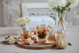 Teabloom Blossoms four 7oz glass teacups ready for serving.