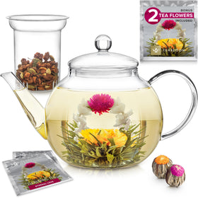 Teabloom Celebration teapot in use, steaming tea with clear glass body