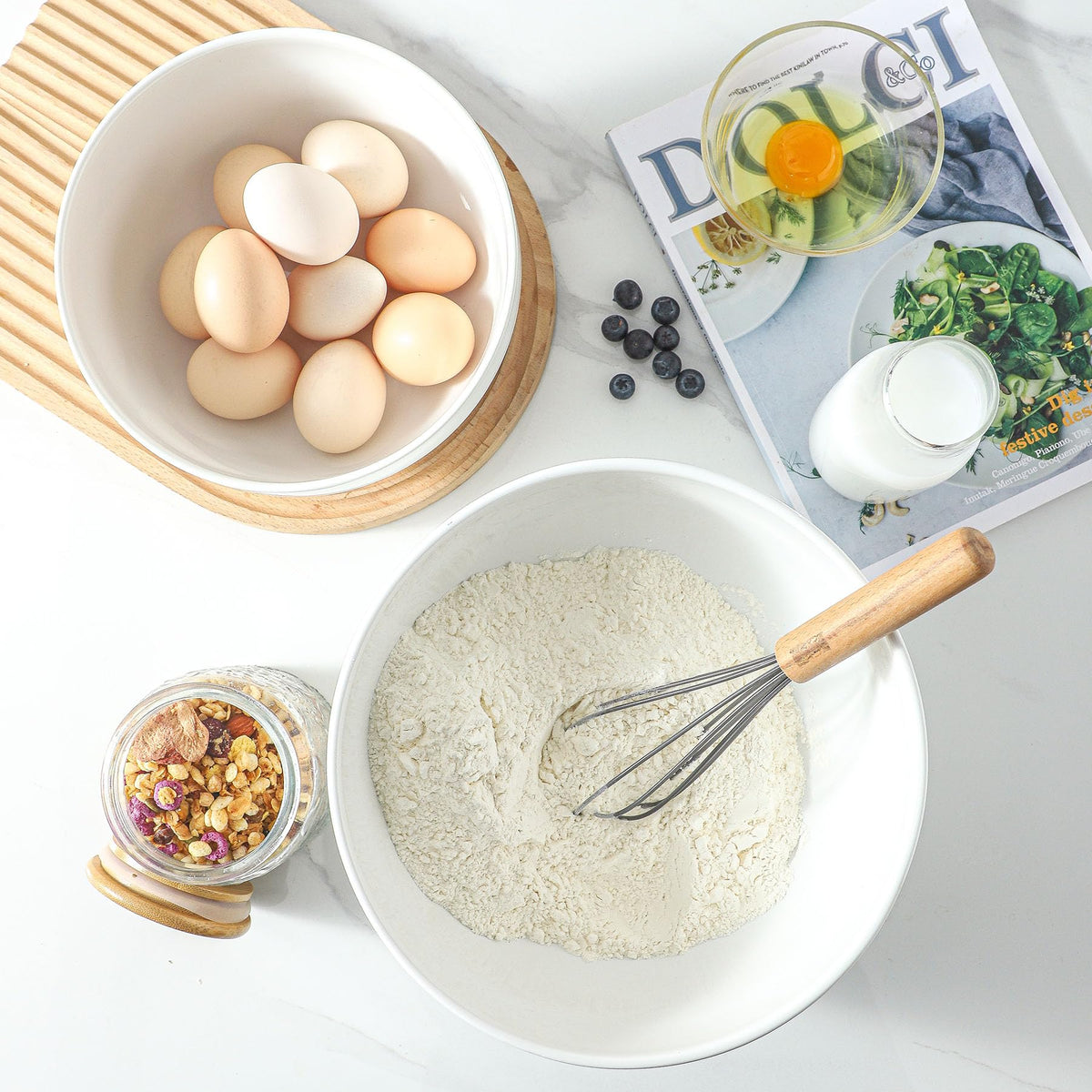 TEAKISS white glaze ceramic mixing bowl close-up showing smooth surface.