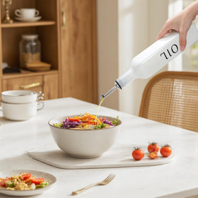 Free funnel included for smooth refilling of oils and vinegars.