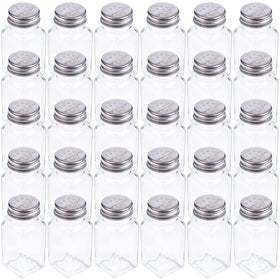 Tebery glass salt and pepper shakers with mushroom tops on a clean tabletop for elegant presentation