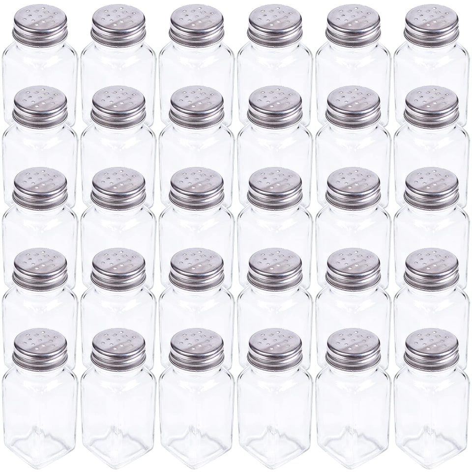 Tebery glass salt and pepper shakers with mushroom tops on a clean tabletop for elegant presentation