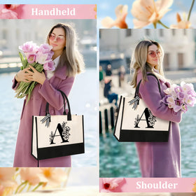 Tecanne Initial Canvas Tote Bag side view with reinforced handles for easy carrying.