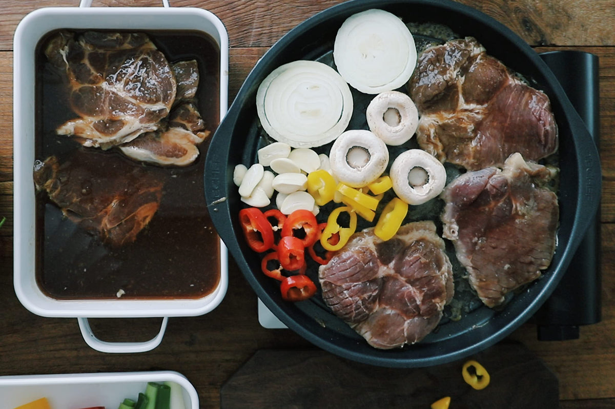 TECHEF KBBQ pan-sizzle captured during a hot sear for flavor-rich crusts
