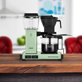 Technivorm Moccamaster KBGV Select drip-stop basket shown for spill-free pours.