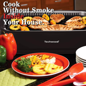 Techwood grill with glass lid preserves moisture and enhances sear.