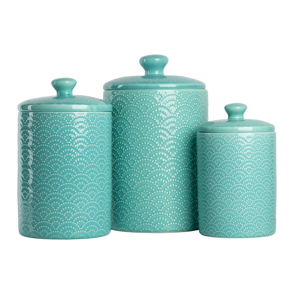 Ten Strawberry Street embossed ceramic small canister in Tide Blue keeps flour fresh on the counter.
