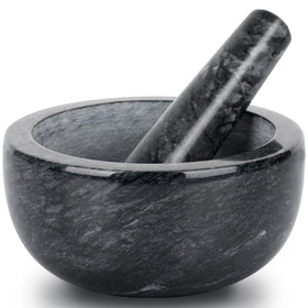 Tera marble mortar and pestle set in black with textured interior for efficient grinding