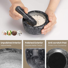 Tera mortar and pestle in use making fresh guacamole.