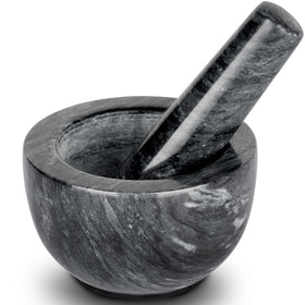 Tera mortar and pestle with natural marble interior texture for effective grinding