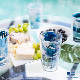 Tervis Currents 16oz tumbler in use on desk with condensation-free surface.