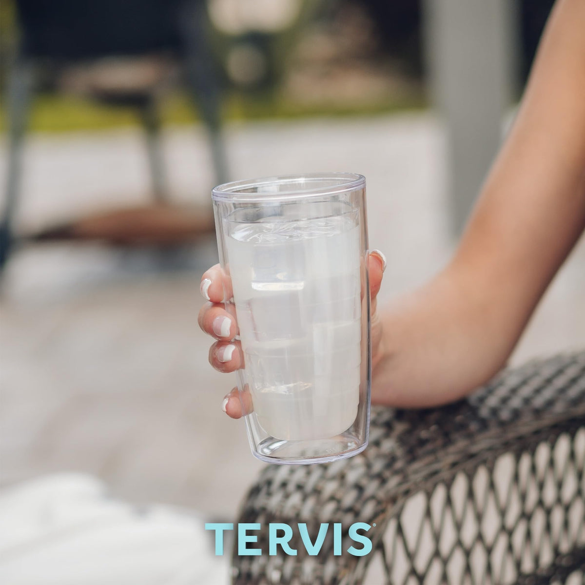 Tervis Gerbera Daisies 16oz tumbler fits most cup holders.