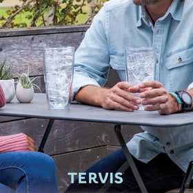 Tervis Gerbera Daisies with lid shows spill-resistant on-the-go use.