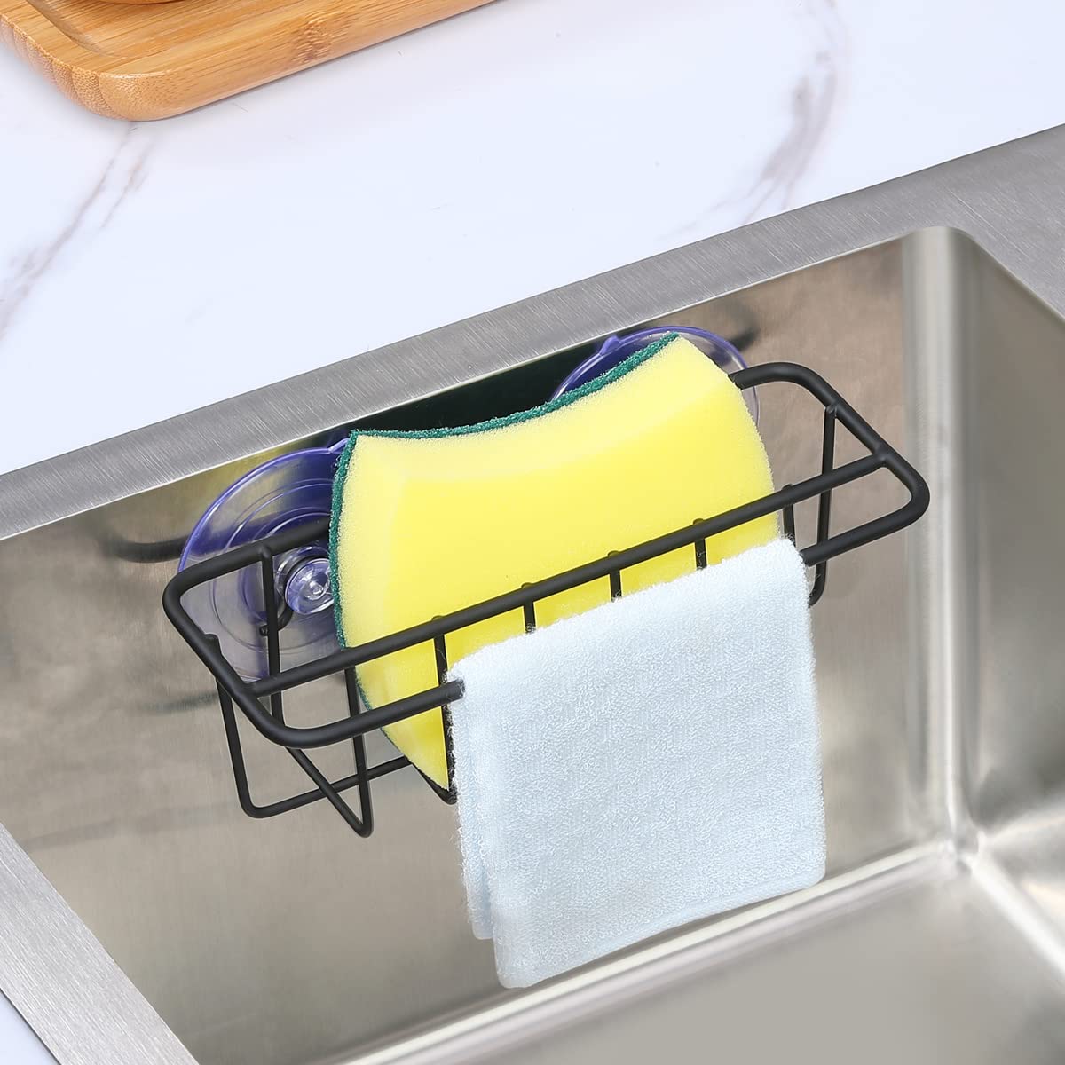 TESOT suction cups secure the holder for splash-free sponge storage.
