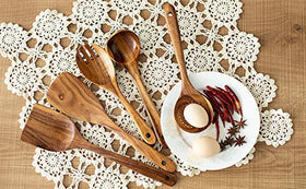 TEZZ wooden utensil set in action on nonstick skillet.