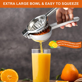 TEZZ lemon-squeezer in action juicing orange for fresh beverages.