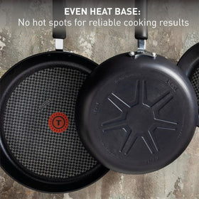 T-Fal oven-safe pan up to 400°F with lid handles high-temperature cooking.