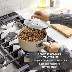 T-Fal Signature riveted bakelite handles provide secure grip.