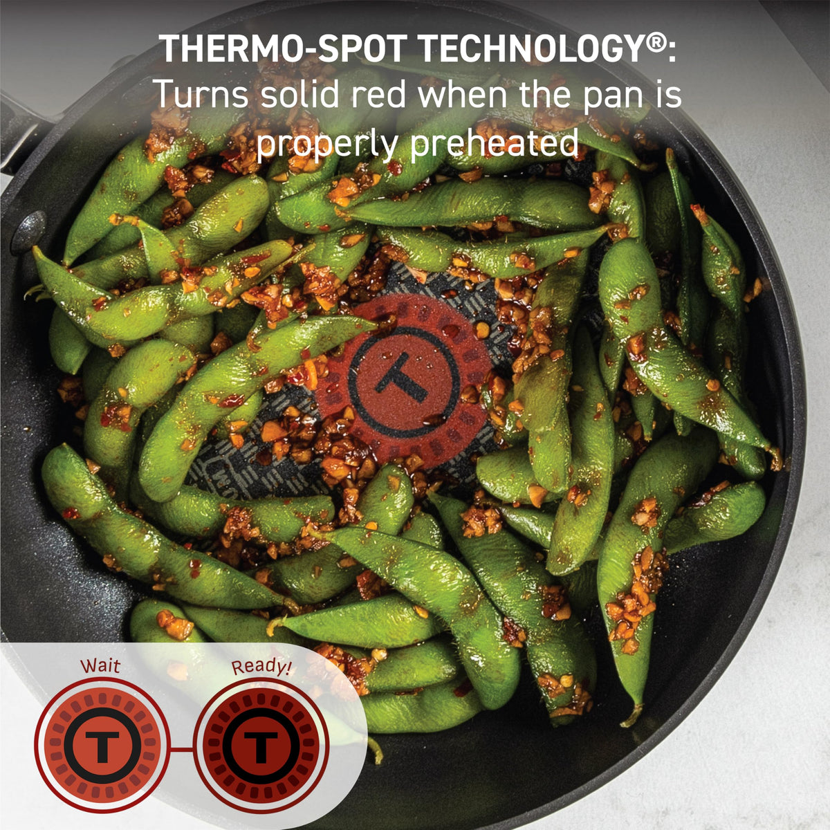 T-Fal Ultimate hard anodized 11.5-inch covered frypan reduces mess while cooking.