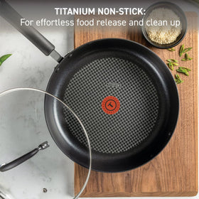 T-Fal Ultimate hard anodized fry pan lid view showing secure fit for simmering.