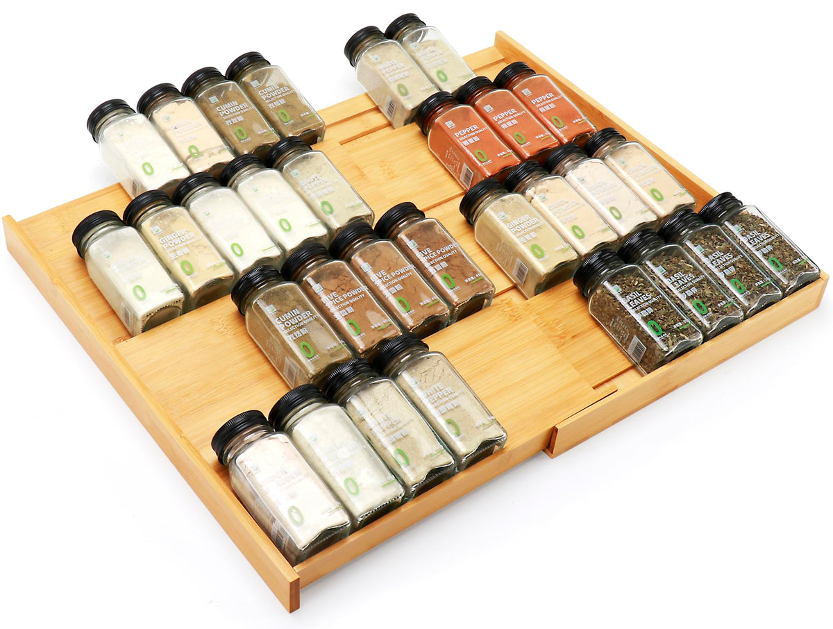Thalomely bamboo spice drawer expands from 12 to 23 inches for flexible drawer fit.