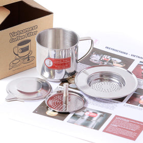 Thang Long screw-down insert demonstrates robust press for customized coffee strength.