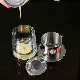Thang Long 8oz filter press with printed instructions for quick setup