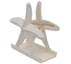 THDC nautical collection napkin holder on a dining table.