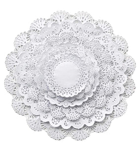 The Baker Celebrations 4-inch doilies add a delicate dessert backdrop.