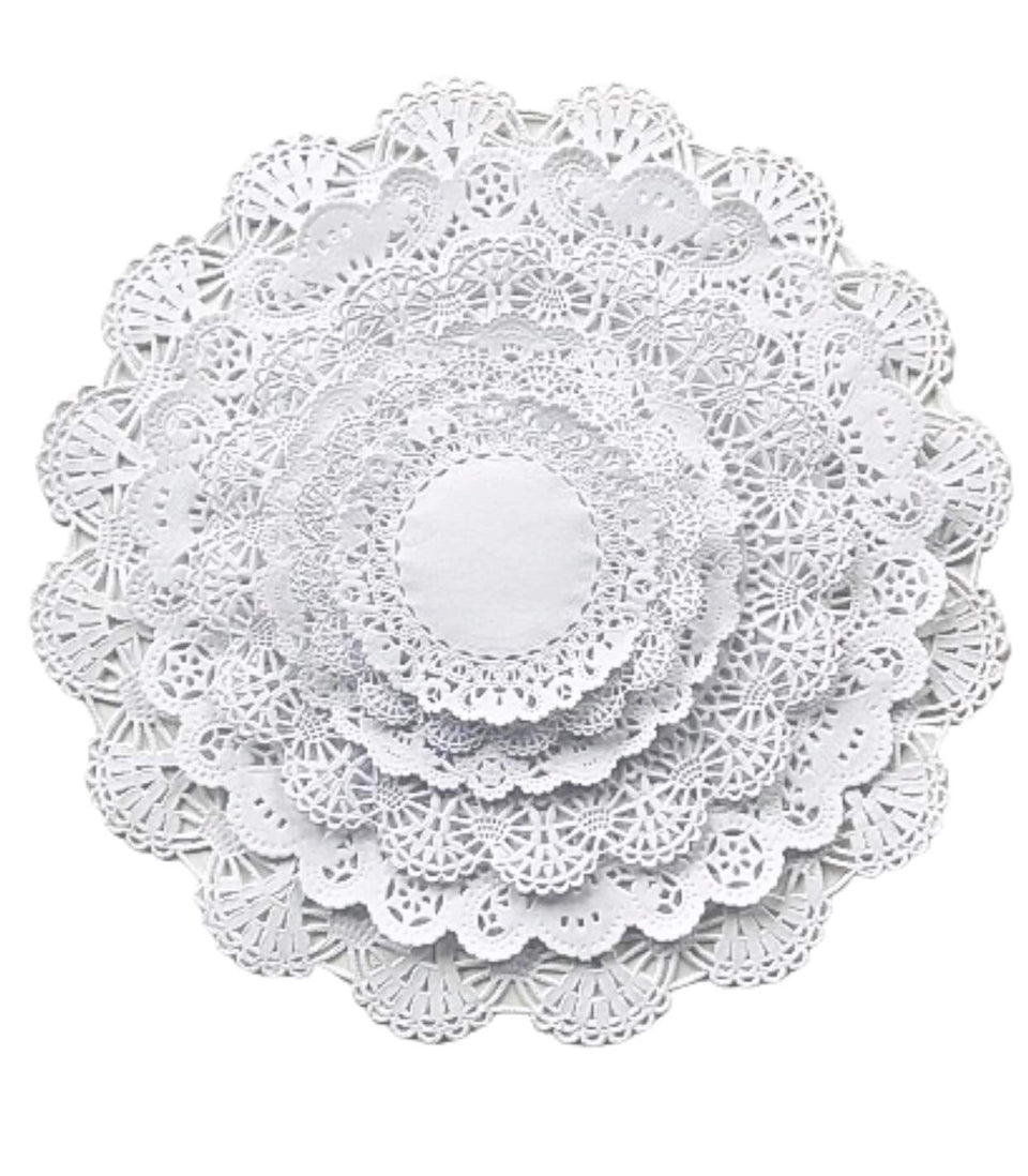 The Baker Celebrations 4-inch doilies add a delicate dessert backdrop.