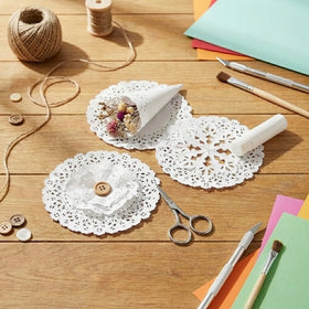 The Baker Celebrations 8-inch doilies provide sturdy support for serving trays.