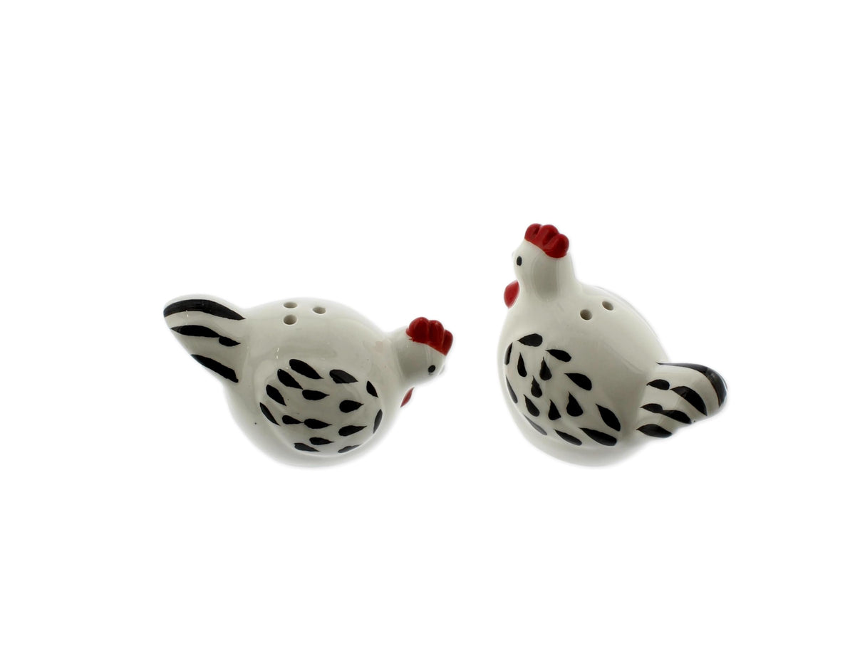 The Bridge Collection chicken shakers rest on kitchen counter adding whimsy
