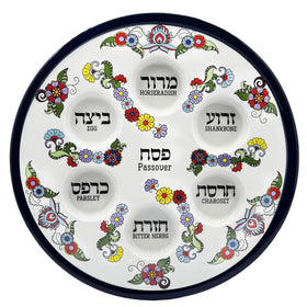 The Dreidel Company ceramic Seder plate in blue Renaissance design for elegant Passover tables.