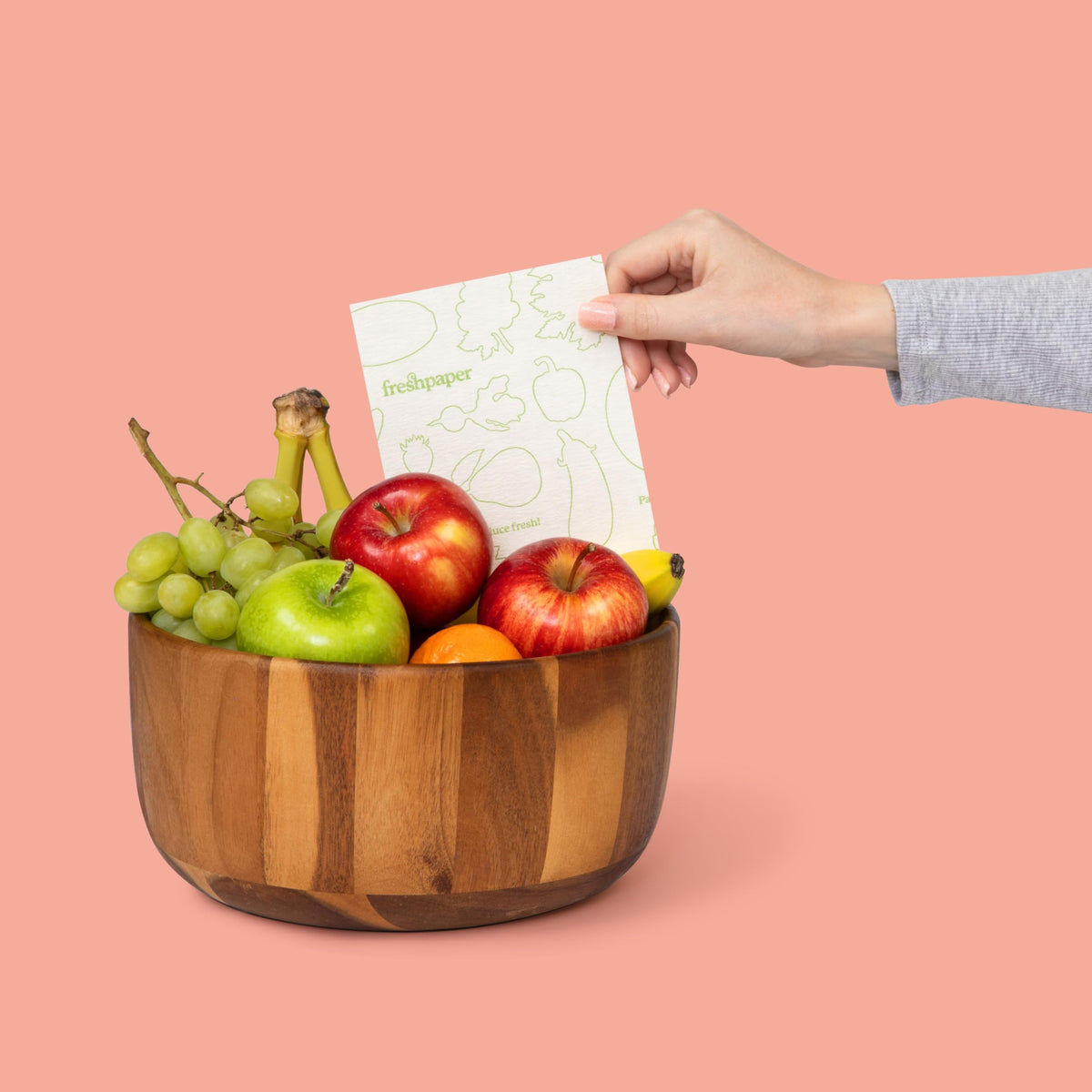 Close-up of FreshPaper sheets cut to fit a small container.