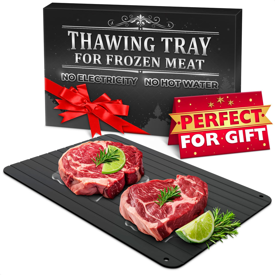 The Little Green Change defrost tray thawing meat on a counter for quick, safe defrost.