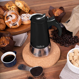 The London Sip ergonomic handle and safety valve on a stovetop in use.