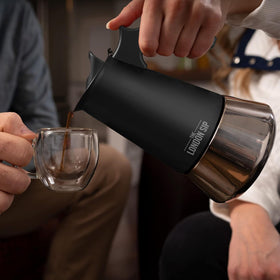 The London Sip moka pot top view highlights the matte black finish.