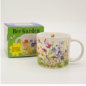 Inside the mug, bees and petals create a charming tea moment.