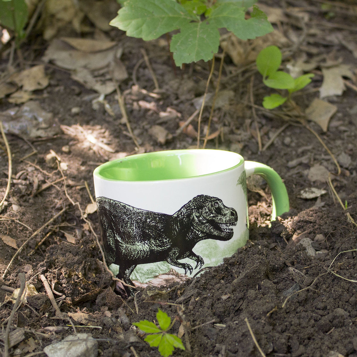 The Unemployed Philosophers Guild Disappearing Dino Mug—gift idea for science lovers and curious minds.