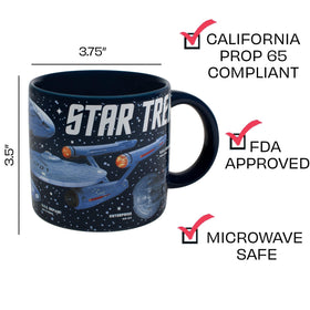 The Unemployed Philosophers Guild Starships mug, dark blue with stars, enhances desk aesthetics.