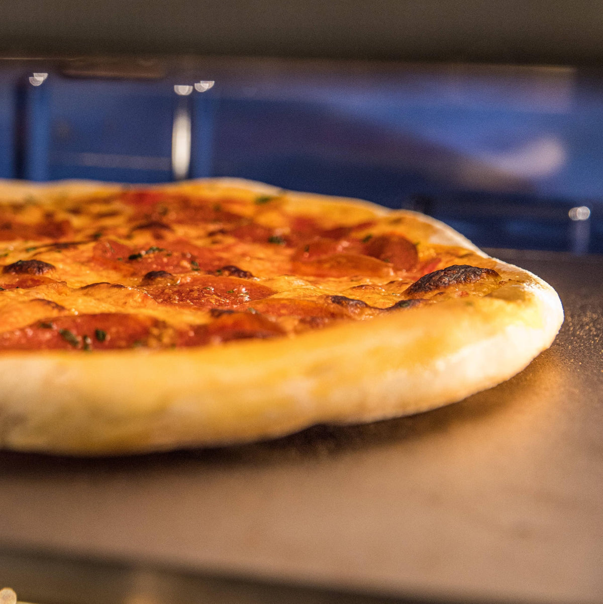 THERMICHEF oven ready pizza steel shown in oven