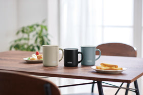 THERMOS JDG-452C mug in daily use scenario demonstrates versatile, everyday convenience.