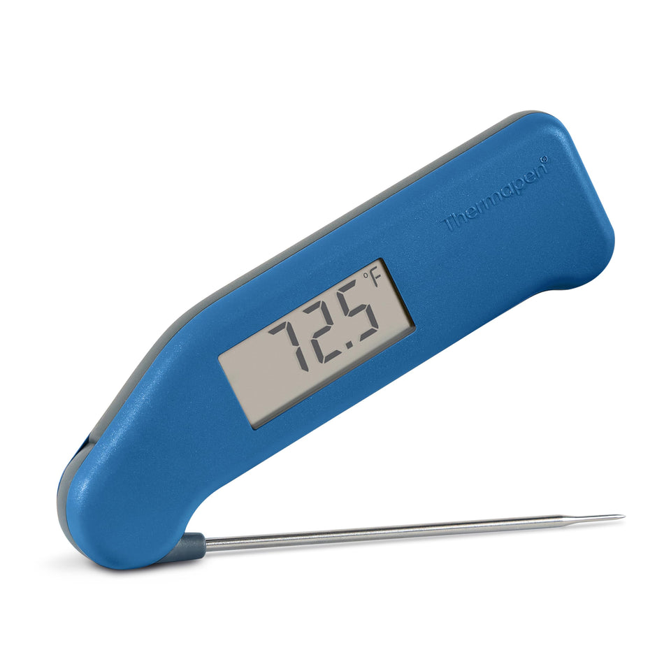 ThermoWorks Classic Thermapen Nautical Blue in use for fast, accurate readings.