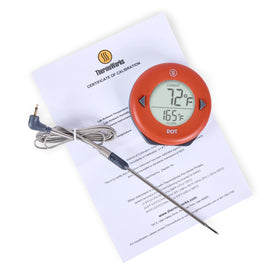 ThermoWorks DOT magnetic back attached to oven for hands-free monitoring.